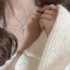 The new Crown Key necklace, made of 925 sterling silver, exudes a sense of sophistication and is a versatile sweater chain with micro-inlays. It is a trendy and personalized accessory details Picture